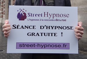 pancarte Jean Emmanuel COMBE : de l’hypnose de rue à la formation de professionnels